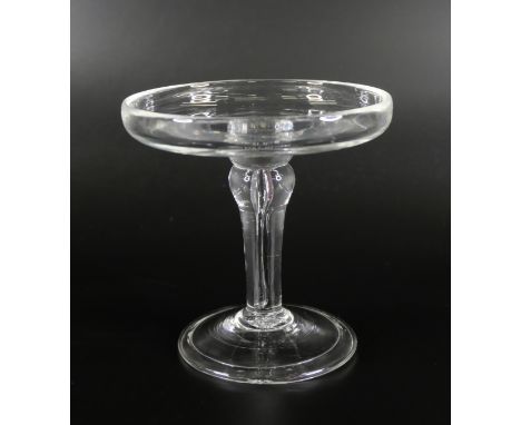 A glass patch stand with balustroid stem, over a conical folded foot 