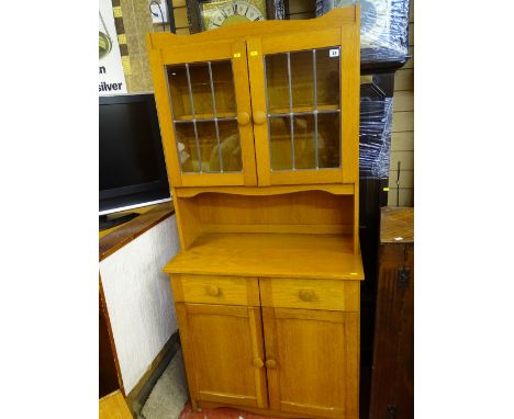 Compact modern light wood dresser with upper leaded glass doors
