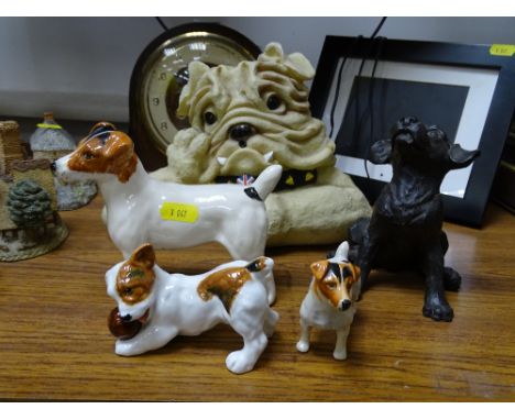 Royal Doulton dog, two Beswick figures, polished mantel clock etc