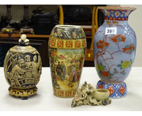 Two Oriental ceramic vases, a soapstone incense burner and a composition storage vessel and cover