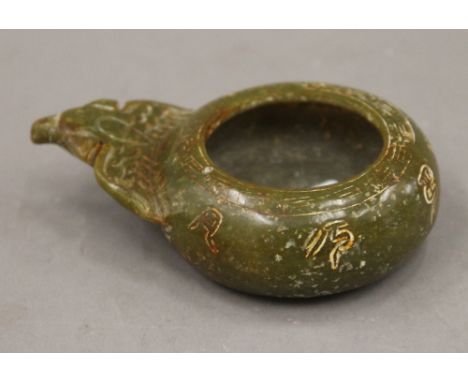 A jade brush washer. 10.5 cm long.