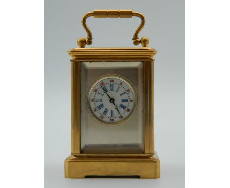 A miniature carriage clock. 7.5 cm high.