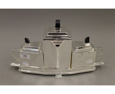 A silver plated Art Deco style tea set. 39 cm wide.