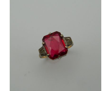 An Art Deco 9 ct gold and silver red stone ring. Ring Size M/N (3.9 grammes total weight)