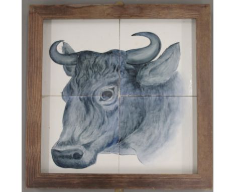 A Butchers shop tile panel depicting a cow, framed. 35 cm wide overall.