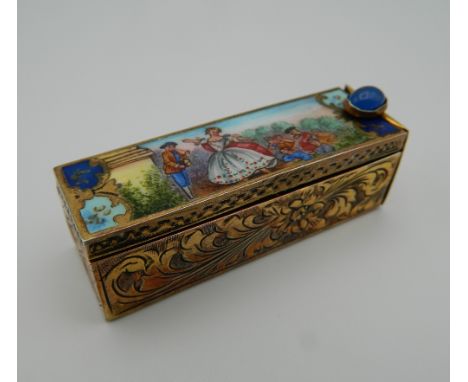 An 800 silver and enamel compact.  5.5 cm long.