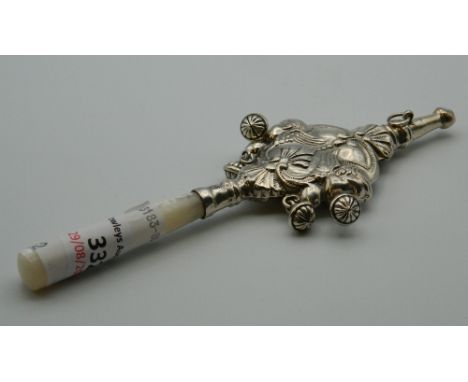 A silver and mother-of-pearl rattle. 16 cm long.