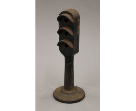 A vintage Astra cast iron traffic light. 19.5 cm high.