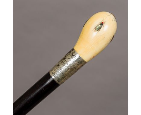 An early 20th century silver collared walking stick, set with shibayama inlaid ivory handle, the handle signed, the collar wi