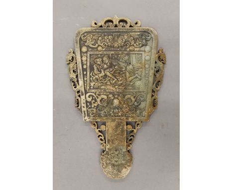 A carved jade hand mirror. 29 cm high.