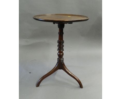 A 19th century mahogany tilt-top tripod table. 51 cm diameter.