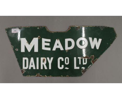 A Meadow Dairy Co Ltd enamel shop bicycle sign. 58 cm long.