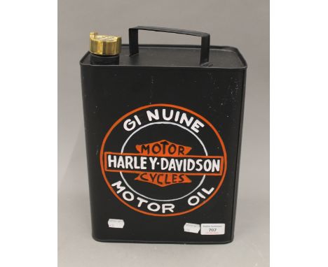 An oil can in the Harley Davidson livery. 32.5 cm high.