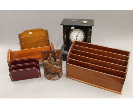 A Victorian slate mantel clock, letter racks, etc. The clock 31 cm high.