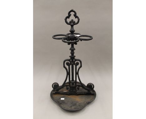 A cast iron stick stand. 60 cm high.