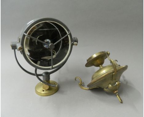 A vintage searchlight by Francis Searchlights, Bolton and a brass hanging light. The former 30 cm high.