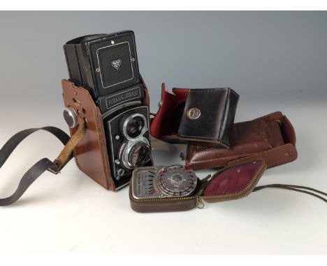 Rolleicord F & H TLR made in Germany ( Rollei-Werke) with 75mm f3.2 original case, strap, light meter case plus a Weston Mast