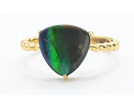 9ct gold ring mounted with a paste with butterfly wing effect, size O, gross weight 2.2 grams 