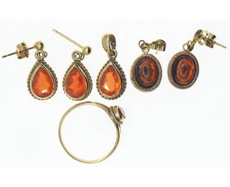 9ct gold jewellery items set with orange stones. Comprising; ring, pendant and two sets of earrings. Gross weight 5.4gOne but