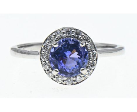 18ct white gold, tanzanite and diamond cluster ring, size N1/2, gross weight 3.25 grams 