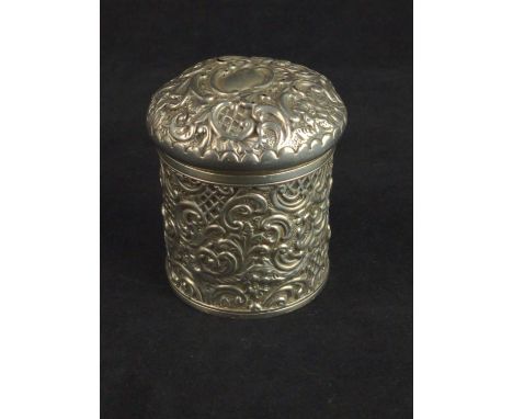Late Victorian silver tea caddy, Mitchell Bosley & Co, Birmingham 1899, with embossed floral and scroll decoration, height 8c