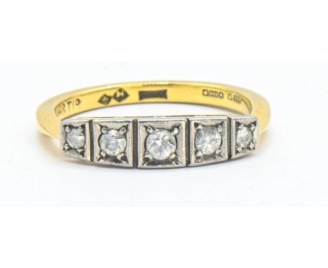 Diamond five stone ring with stones set into square millgrain platinum settings on an 18ct gold band, size M. Gross weight 2.