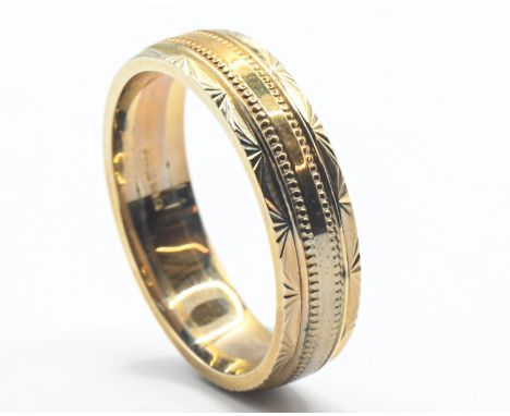 9ct gold engine turned band, size N weight 4.11 gms 