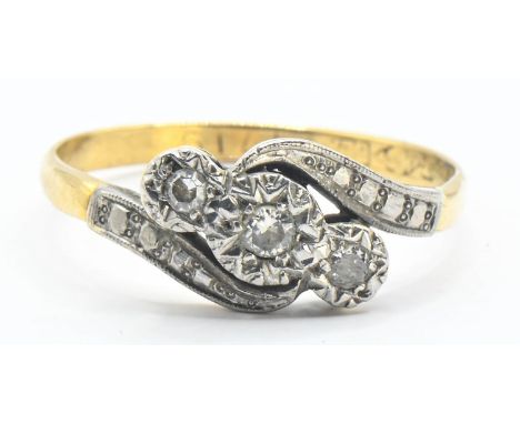 18ct gold and diamond crossover ring, size Q. Gross weight 2.63g 