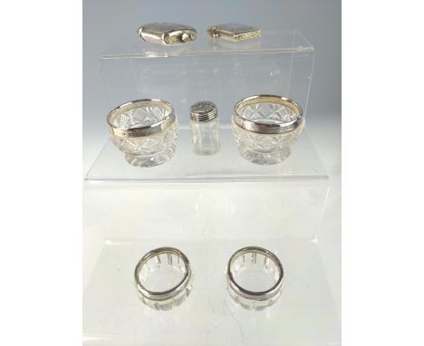 Silver cased vesta converted into a cigarette lighter, silver vesta case, two pairs of silver rimmed glass salts and a silver