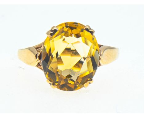 9ct gold ring set with an oval mixed cut citrine. Size K. Gross weight 2.65g 