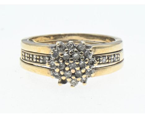 9ct gold and diamond cluster ring with split shoulder design, size J 1/2, gross weight 3.80g.splits in to 2 rings 