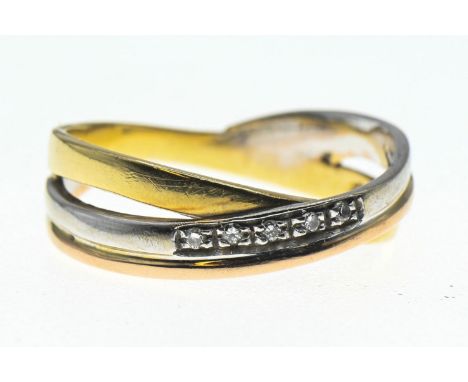 Tricoloured yellow metal crossover ring set with diamonds. Size O, gross weight 3.49gThe shank is stamped but fineness not no