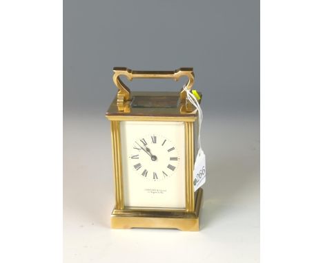 Garrard & Co. brass carriage clock with bevelled glass sides. W 8cm x D 6cm x H 15cm.running 
