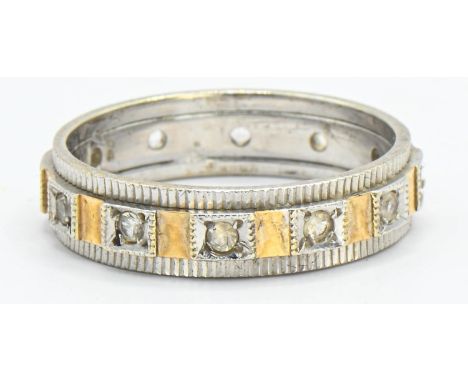 9ct white gold full eternity ring set with white stones (testing as spinel). Size Q 1/2. Gross weight 4.16g 