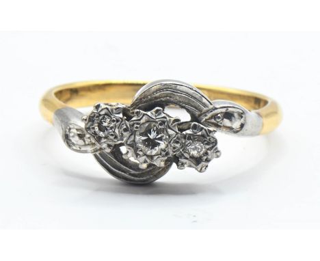 18ct gold and diamond crossover ring. Size N, gross weight 3g. 