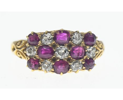 Ruby and diamond cluster ring featuring old cut stones. Comprising of 8 rubies and seven diamonds. Size Q. Gross weight 3.77g
