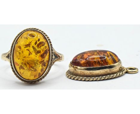9ct gold amber set ring and pendant. Ring size L. Gross weight 4.73g 