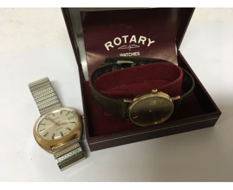 A gold Rotary watch in a box with paperwork, and a Vintage gents Montine 25 jewel manual.