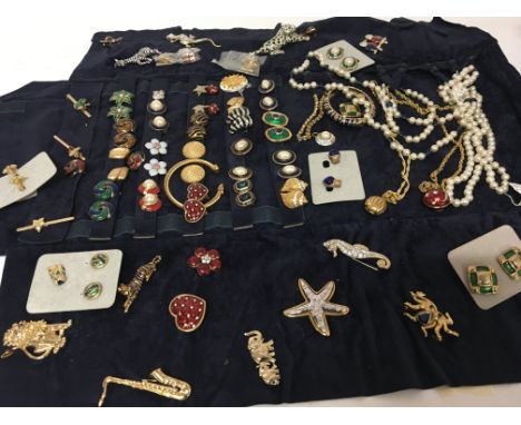 A collection of Cabochon dress jewellery enamel decorated and set with simulated diamonds including animal brooches. (a lot)