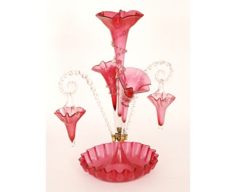 A large late 19th Century Stourbridge ruby glass epergne with a deep frill rim bowl rising to a tall central trumpet with app