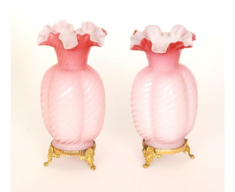 A pair of late 19th Century John Walsh Walsh post vases of quatrelobed form with wide frill rims, cased in a graduated ruby o