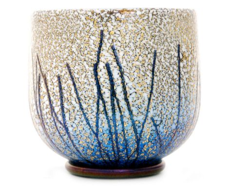 A later 20th Century Isle of Wight Golden Rain glass bowl of footed straight sided form, decorated with deep blue lines over 