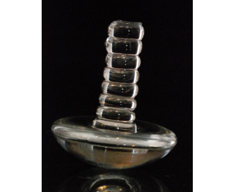 A 19th Century glass linen smoother with a bobbin stem above a domed base, height 12cm.