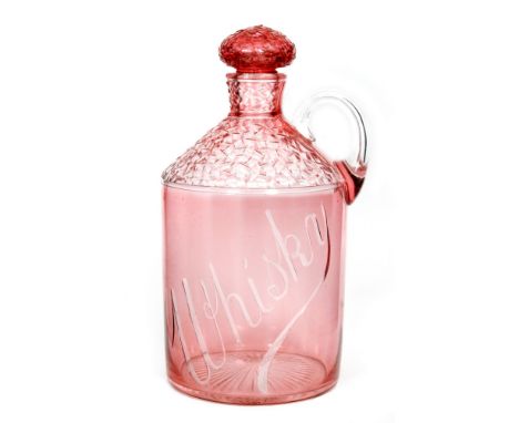 An early 20th Century Stevens and Williams whisky decanter of sleeve form with tapered neck and applied finger loop handle, a