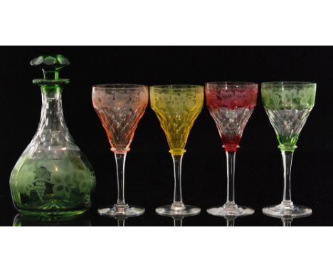 A part suite of John Walsh Walsh wine glasses in the Fruiting Vine pattern, each with a colour cased bowl with a border of en