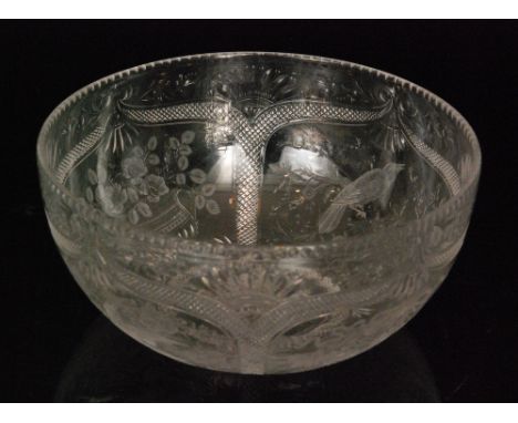 An early 20th Century Webb and Corbett crystal glass bowl by Jack Lloyd, decorated with alternate intaglio cut and engraved p