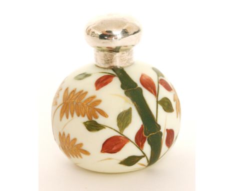A late 19th Century Thomas Webb and Sons uranium Ivory scent bottle of spherical form, hand enamel decorated with bamboo stem