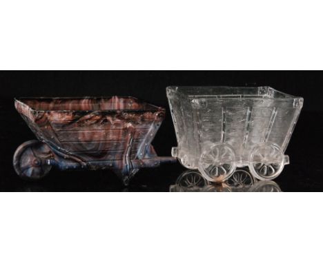 A late 19th Century W.H. Heppel purple malachite pressed glass posy trough in the form of a colliery cart, together with a si