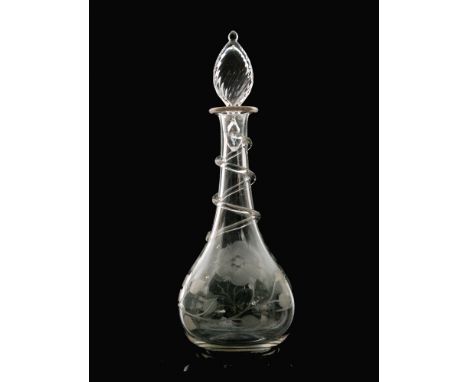 An early 20th Century John Walsh Walsh clear crystal decanter of low shouldered form with slender collar neck below a compres