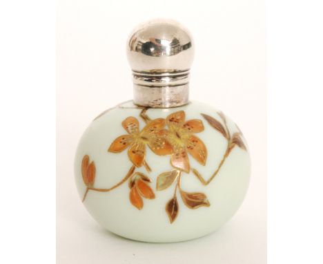 A late 19th Century Thomas Webb and Sons uranium Ivory scent bottle of spherical form, hand enamel decorated with a flowering